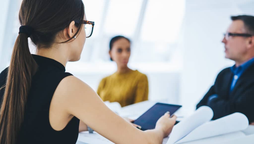 three-people-in-a-meeting